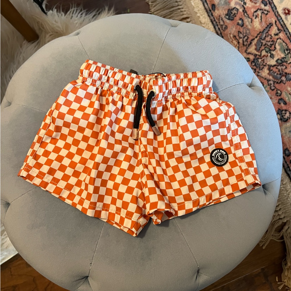 Orange / white binky bro swim trunks
